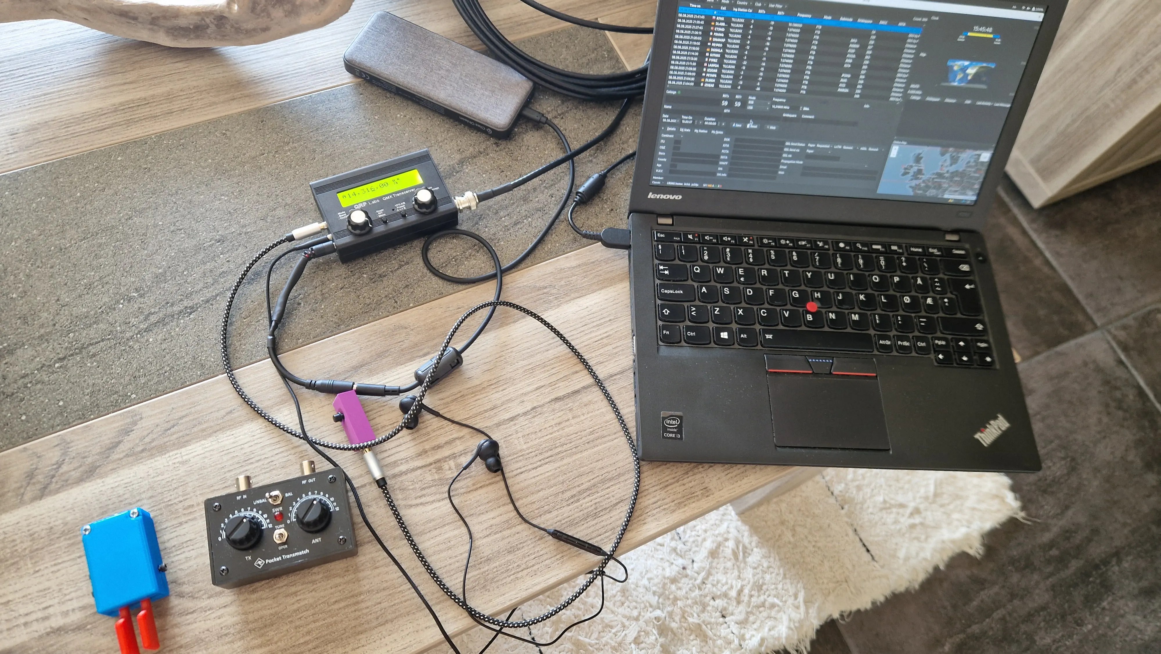 QMX radio, powerbank, microphone and laptop - ready to operate.